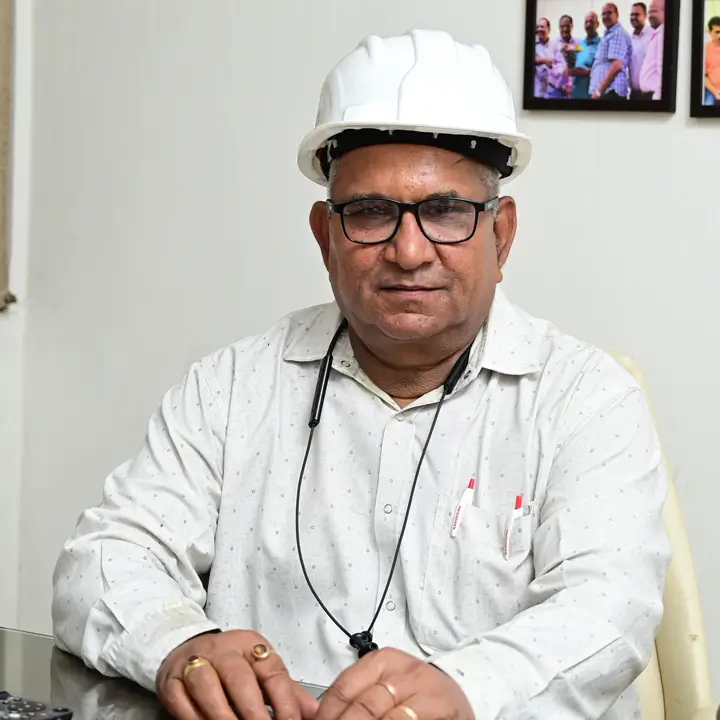 Mr. Photosingh Sharma